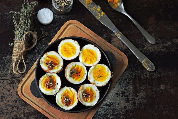 Boiled eggs with herbs and sesame. Keto breakfast or snack. Delicious soft boiled eggs.