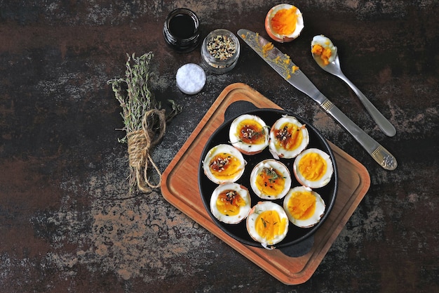 Boiled eggs with herbs and sesame. Keto breakfast or snack. Delicious soft boiled eggs.