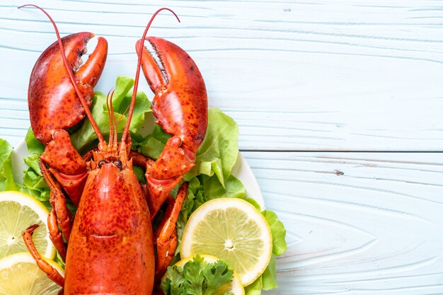 boiled lobster with vegetable and lemon