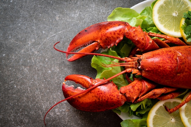 boiled lobster with vegetable and lemon