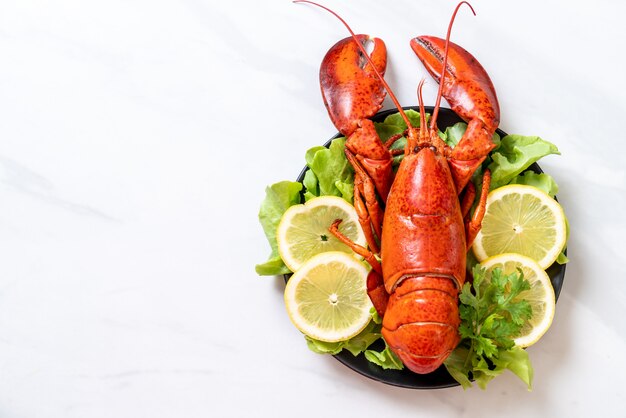 boiled lobster with vegetable and lemon