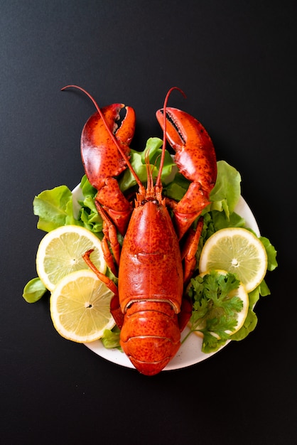 boiled lobster with vegetable and lemon