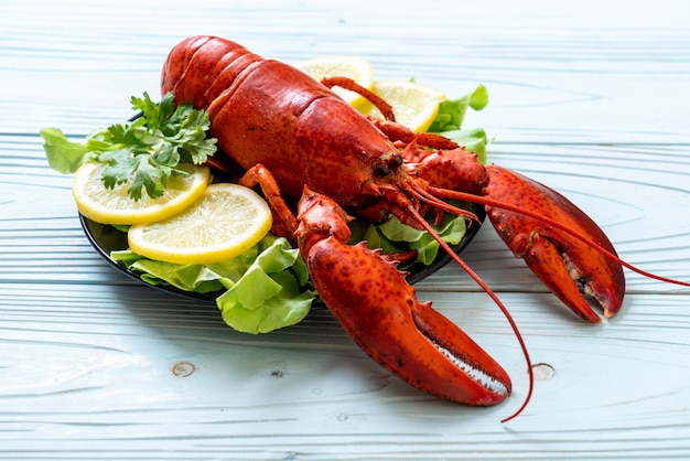 boiled lobster with vegetable and lemon