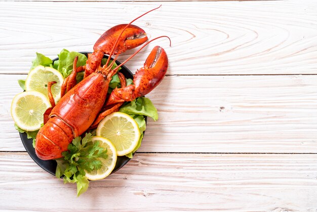 boiled lobster with vegetable and lemon