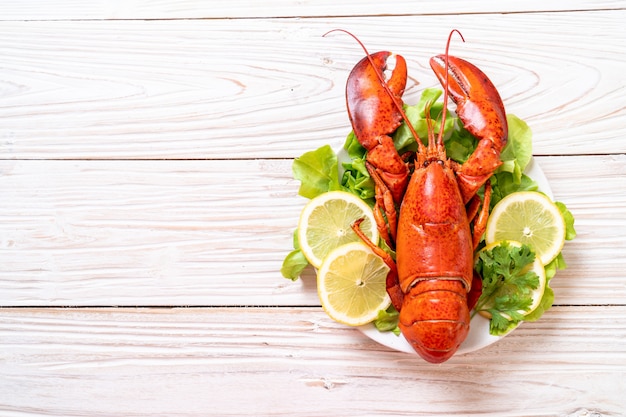 boiled lobster with vegetable and lemon