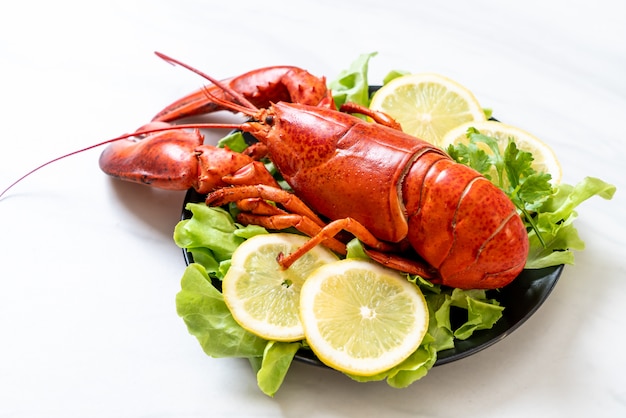 Boiled lobster with vegetable and lemon