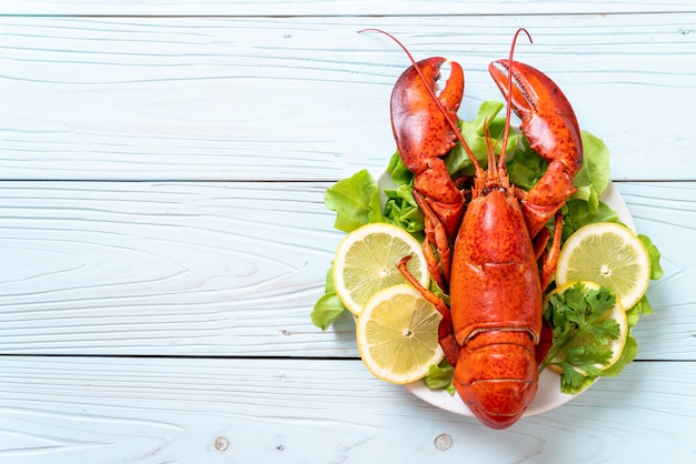 boiled lobster with vegetable and lemon