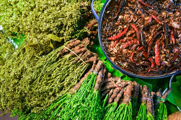 Boiled neem flowers and spicy sweet and sour tamarind dip or in Thai Popular Thai food