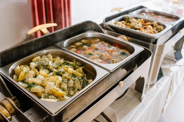 Boiled potatoes in bowl on the buffet table