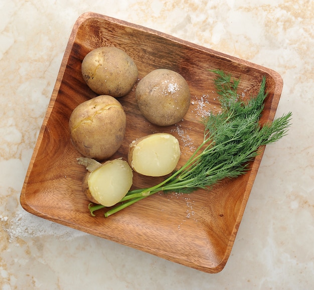 Boiled potatoes in their skins with parsley