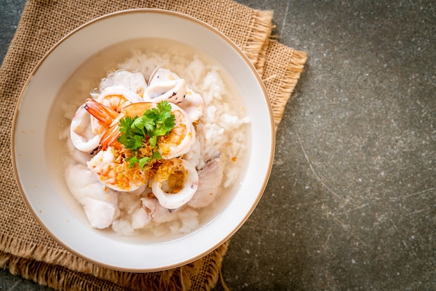 Boiled rice soup with seafood