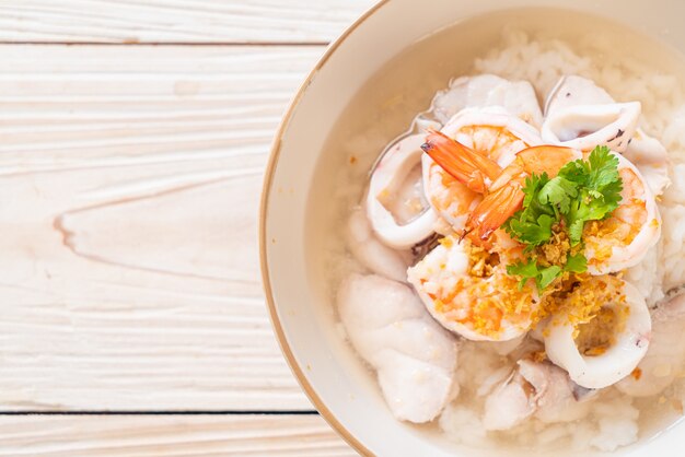 Boiled rice soup with seafood