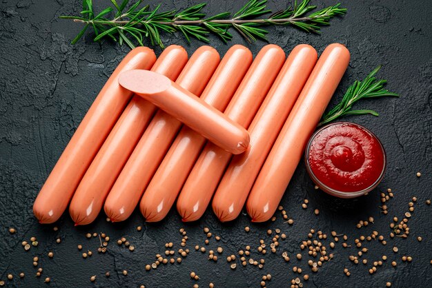 Boiled sausages on a dark background Wiener