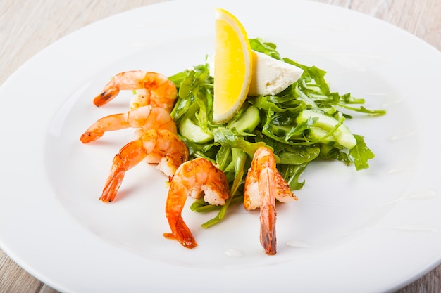 boiled shrimp with salad and curd cheese