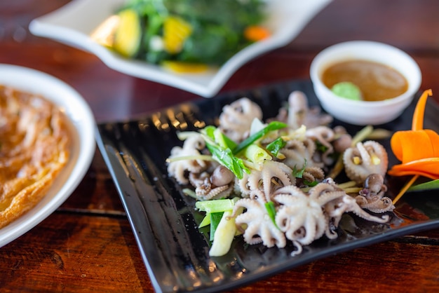 Boiled small squid dish in restaurant