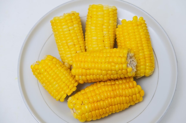 Boiled sweet corn served in a plate