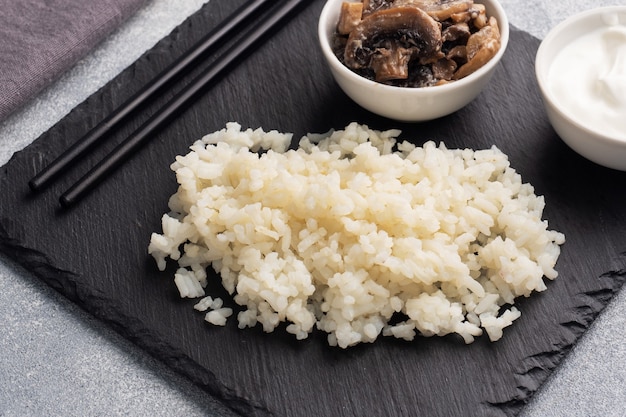 Boiled white rice with mushrooms