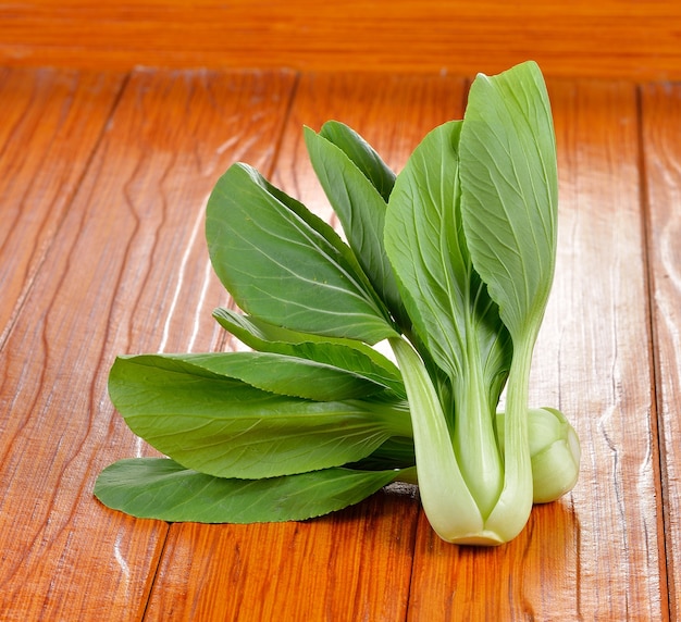 Bok choy vegetable on wooden background