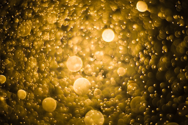 bokeh abstract background with yellow gold light color