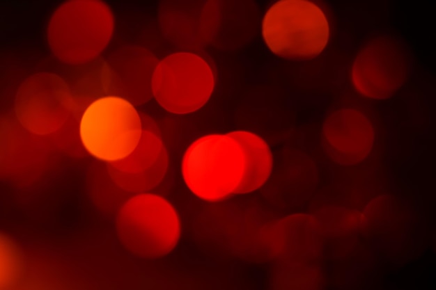 Bokeh abstract texture colorful red defocused background Dimmed light