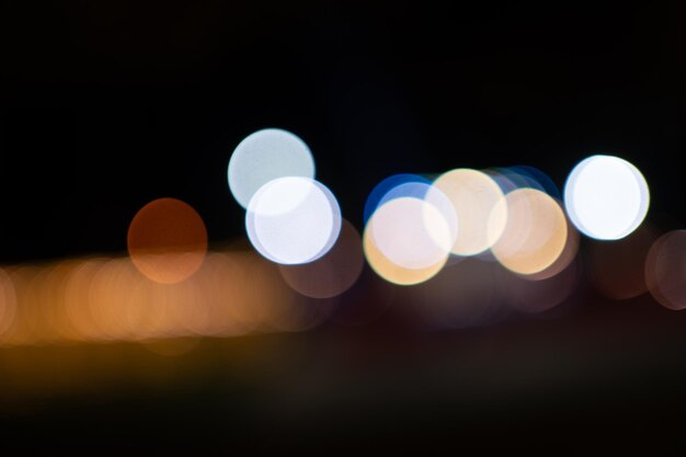 Foto sfondo bokeh su sfondo scuro