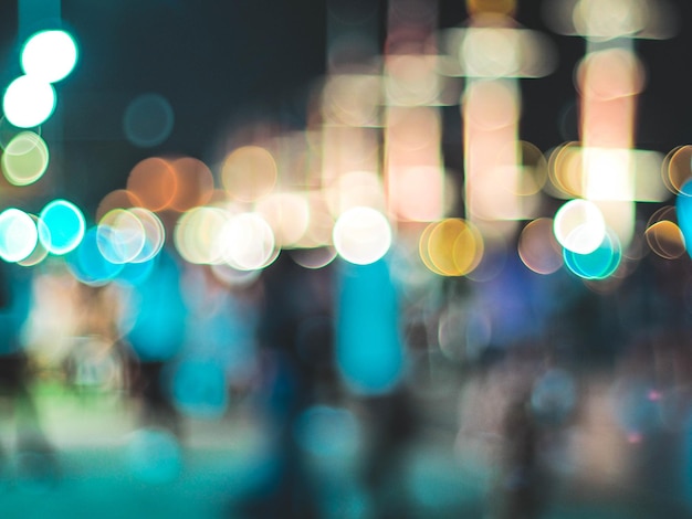 Bokeh city lights background bokeh of cityscape skyline during evening dark blue