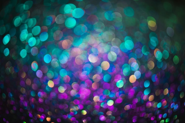 Bokeh-effect glitter kleurrijke wazig abstracte achtergrond voor verjaardag verjaardag bruiloft oudejaarsavond of Kerstmis