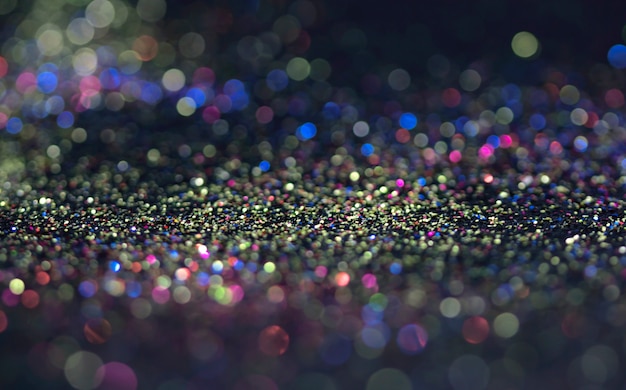 Photo bokeh glitter fly and lights on black