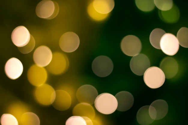 Bokeh Spring background Defocused bright lights on yellowgreen background