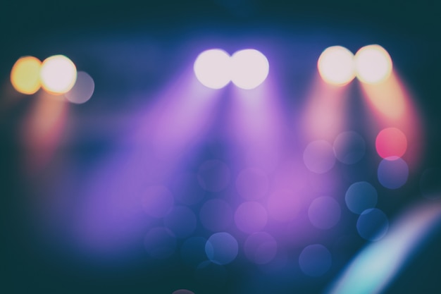 Photo bokeh wallpaper. disfocus or blurred background of the stage lighting in vintage color.