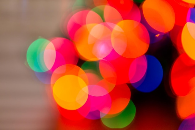 Boken background of colorful Christmas lights.