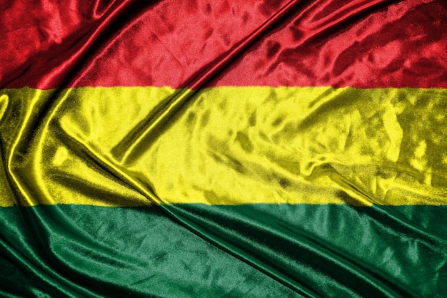 Foto bandiera di stoffa bolivia bandiera di raso tessuto sventolante texture della bandiera xdxaxdxa