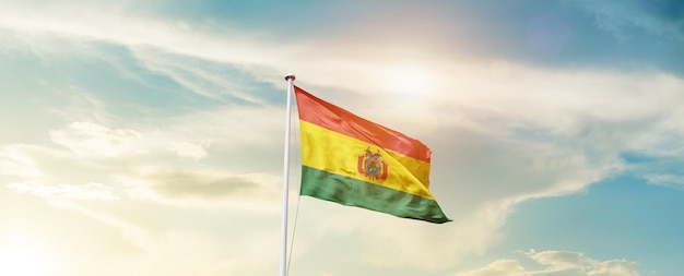 Bolivia national flag waving in beautiful sky