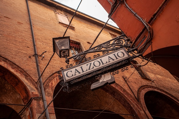 BOLOGNA, ITALY 17 JUNE 2020: Calzolaio sign, in English shoemaker