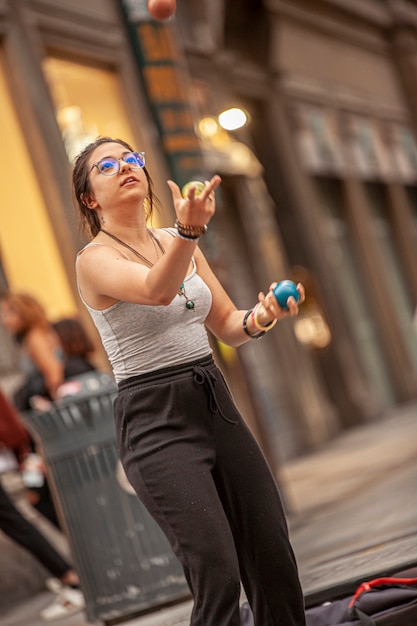 BOLOGNA, ITALY 17 JUNE 2020: Street artist juggler in Bologna, Italy