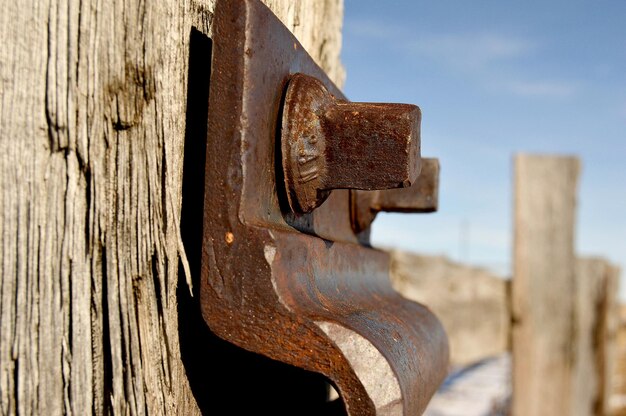 Photo bolted plate attached on railroad tie