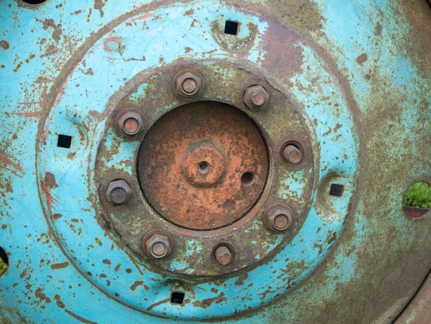 Bolts In the Hub of an old rusty wheel tractor Wheels close up