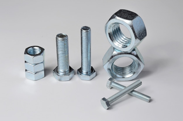 Bolts and screw-nut of different sizes. Concept. 