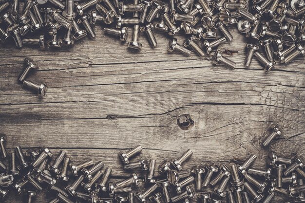 Bolts on the wooden table