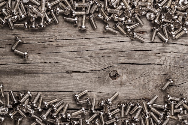 Bolts on the wooden table