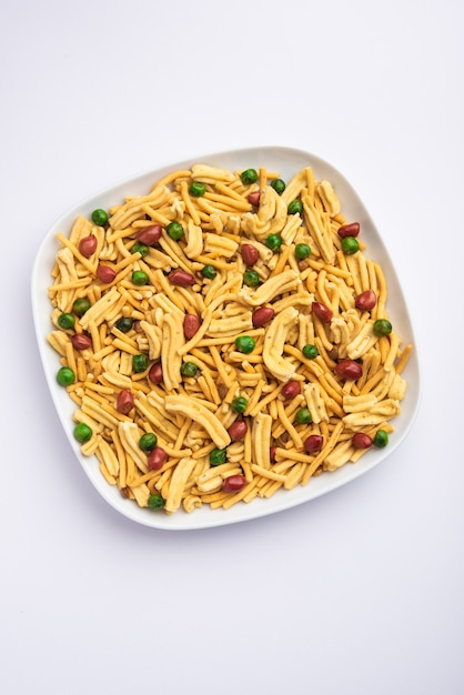 Bombay mix or Chanachur or Chiwda or farsan is an Indian snack mix, popular tea-time food from India