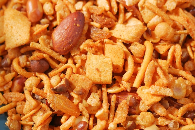 Bombay mix or Chiwda on yellow background