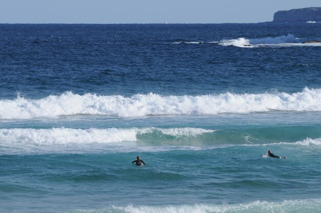 Bondi beach and surfers in Sydney Australia