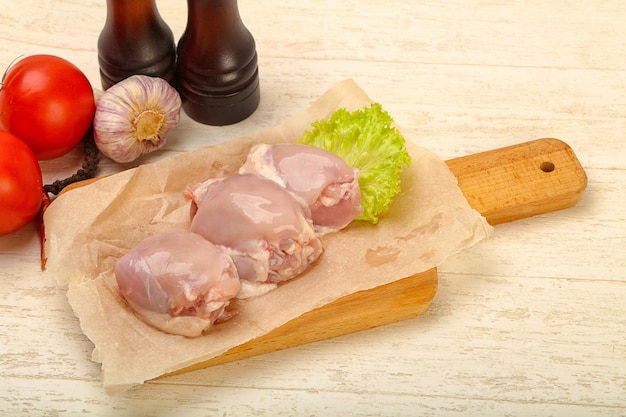 Boneless raw chicken thighs