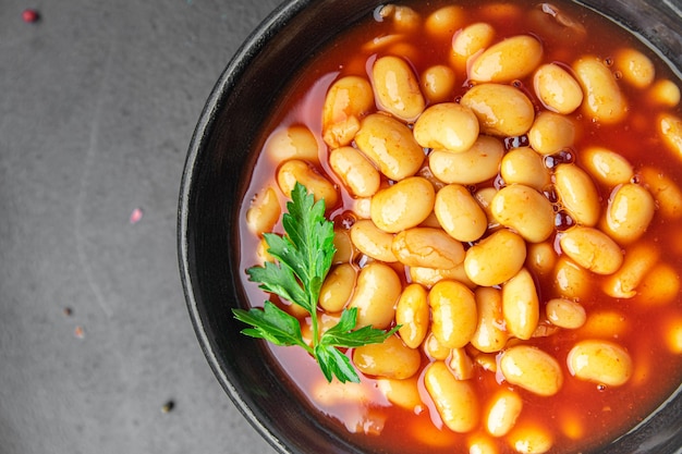 bonen tomatensaus bonenschotel maaltijd eten snack op tafel kopieer ruimte voedsel achtergrond