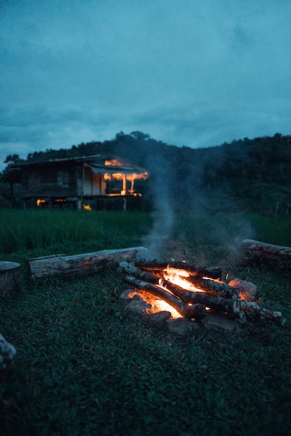 bonfire in the field at dusk