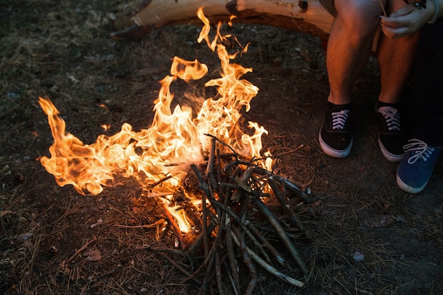 Bonfire warm tourism nature forest concept. Hiking spirit.