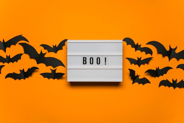 Boo halloween lightbox message with black scary bats