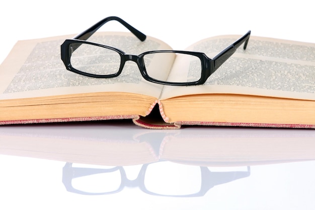 Book and eyeglasses