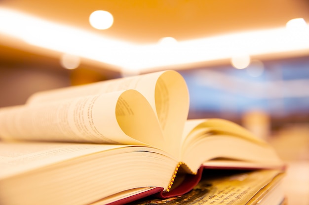 A book in heart shape on the table